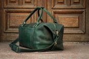 Кожаная мужская дорожная сумка зеленого цвета